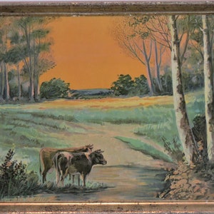 Vintage color lithograph depicting a pair of cows at a pond.