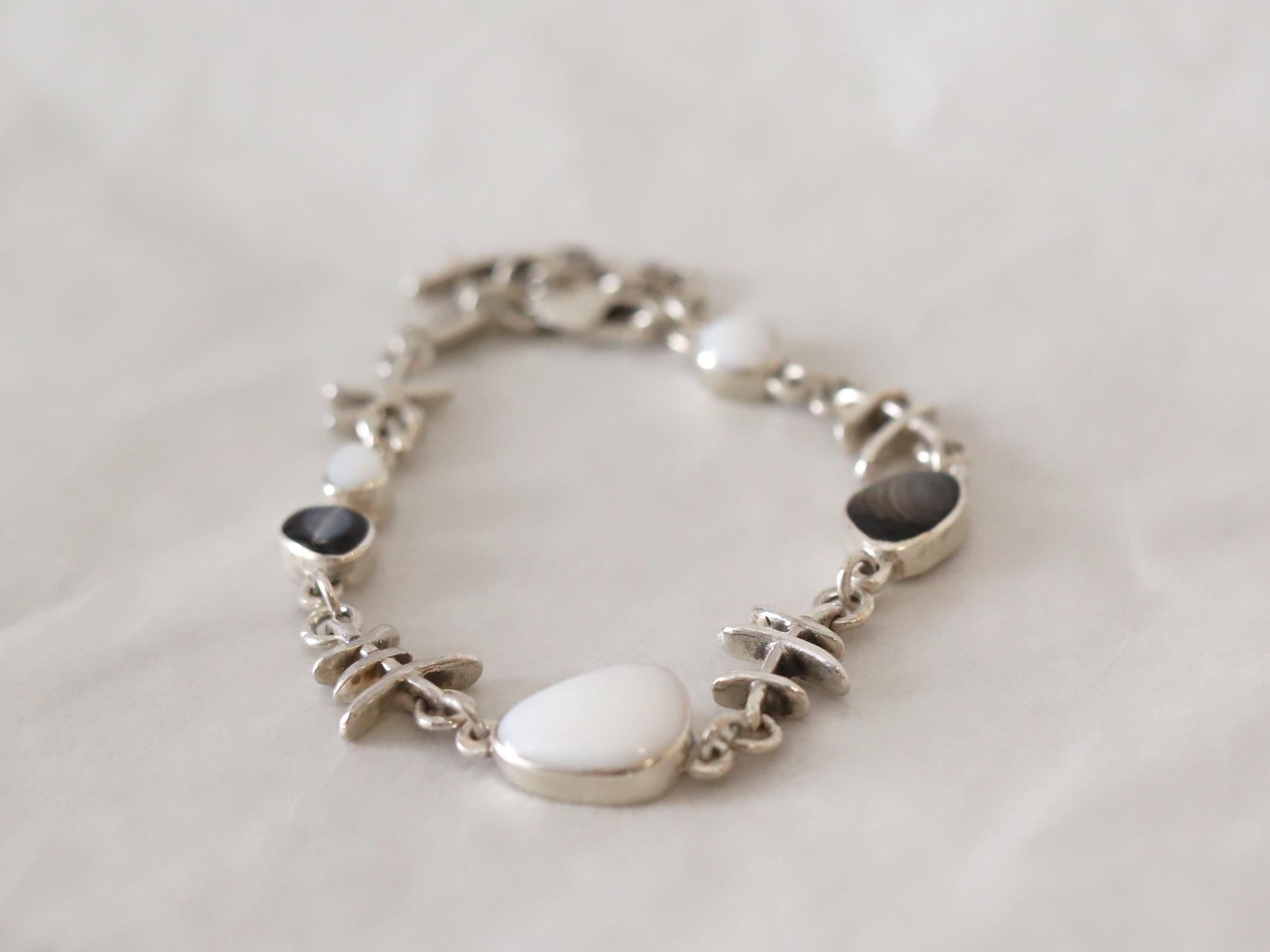 Artisan silver fish bohe bracelet. Skeleton Mother of pearl bracelet OOAK, silversmith jewelry.