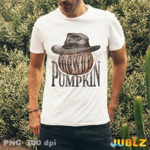 May include: A white t-shirt with a graphic of a pumpkin wearing a cowboy hat. The text "Howdy Pumpkin" is printed below the pumpkin.
