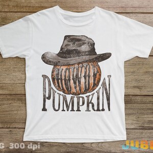 May include: White t-shirt with a brown and black cowboy hat on top of a pumpkin with the text "Howdy Pumpkin" printed on the front.