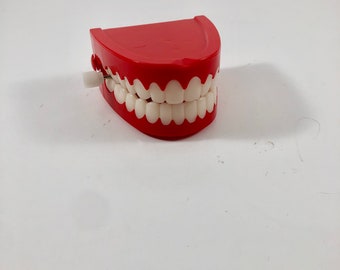 thumbnail image 2 of Novelty Funny Wind Up Walking Wind Up Teeth With Eyes Feet 2 of 10