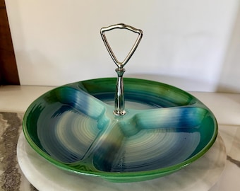 May include: A vintage ceramic serving tray with a silver handle. The tray has three sections and is decorated with a blue and green swirl pattern.