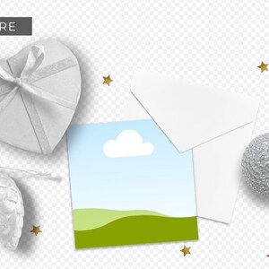 May include: A white card with a blue sky and green hills, a white envelope, a silver heart-shaped box with a white ribbon, a silver ornament shaped like a pine cone, and a silver ball ornament. There are gold stars scattered around the objects.