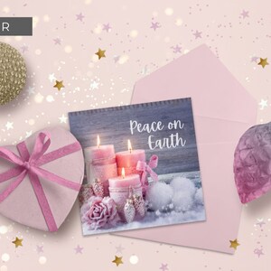 May include: A pink envelope with a white card inside. The card has a picture of three pink candles with the text "Peace on Earth". The envelope and card are surrounded by pink and gold glitter.