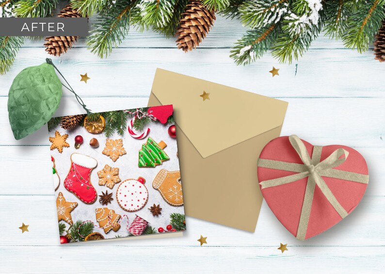 May include: A Christmas card with a festive design featuring gingerbread cookies, candy canes, and a Christmas tree. The card is on a white wooden surface with a brown envelope and a heart-shaped gift box.
