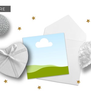 May include: A white envelope with a white card inside. The card has a blue sky with a white cloud and a green grassy hill. There are gold stars scattered around the card and envelope.