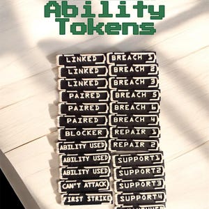 May include: Black and white Gundam Ability Tokens with text like "Linked" and "Breach 1". The tokens are stacked on a white wooden surface. The text "Gundam Ability Tokens" is in green.