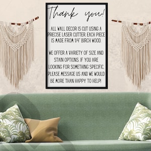 May include: A black framed sign with white text that reads "Thank you!"  All wall decor is cut using a precise laser cutter. Each piece is made from 1/4" birch wood. We offer a variety of size and stain options. If you are looking for something specific, please message us and we would be more than happy to help!"