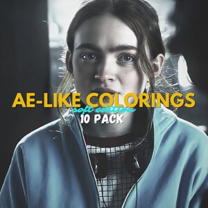 May include: A young person with long brown hair wearing a blue jacket with a grid pattern on the collar. The text "AE-LIKE COLORINGS soft edition 10 PACK" is in yellow letters on a black background.