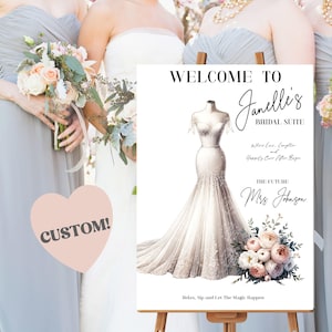 May include: A wedding sign on an easel with the text "WELCOME TO Janelle's BRIDAL SUITE". The sign features a drawing of a wedding dress and floral arrangements. The sign also includes the text "The Future Mrs. Johnson".