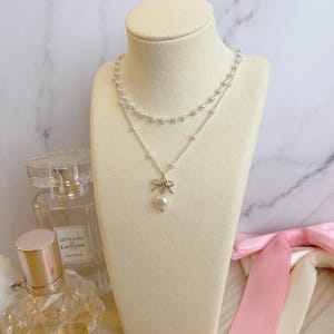 Coquette Silver Pearl Bow Charm Necklace | Two Layer Beaded Choker | Dollcore Fairycore Jewelry Minimalist Regency Pendant Bow Tie Pendant