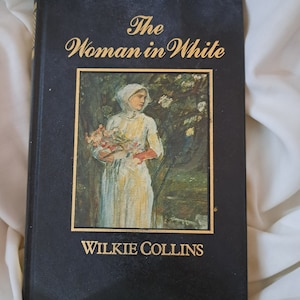 The *WOMAN IN WHITE* by Wilkie Collins &#39;The Great Writers&#39; Library edition 1987 Marshall Cavendish Black Hardbound