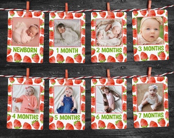 Peut inclure: Un ensemble de huit cartes photo avec un motif de fraises. Chaque carte a un cadre blanc avec une photo d'un bébé à différents âges. Les cartes sont étiquetées avec l'âge du bébé en mois, en commençant par "Nouveau-né" et en terminant par "7 mois".