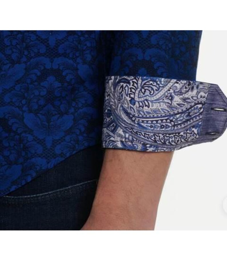 May include: A set of three ceramic mugs with a speckled, matte finish. The mugs are in shades of cream, light brown, and dark brown. Each mug has a simple, minimalist design, perfect for coffee or tea.