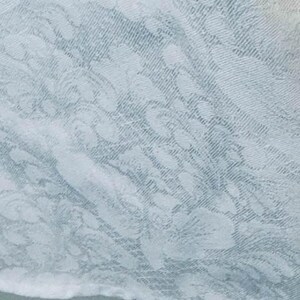 May include: A set of three ceramic mugs with a speckled, matte finish. The mugs are in shades of cream, light gray, and dark gray. Each mug has a simple, minimalist design, perfect for coffee or tea.