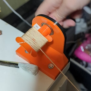 Broderigarns spolvinda: Korsstygnsorganisatör Orange