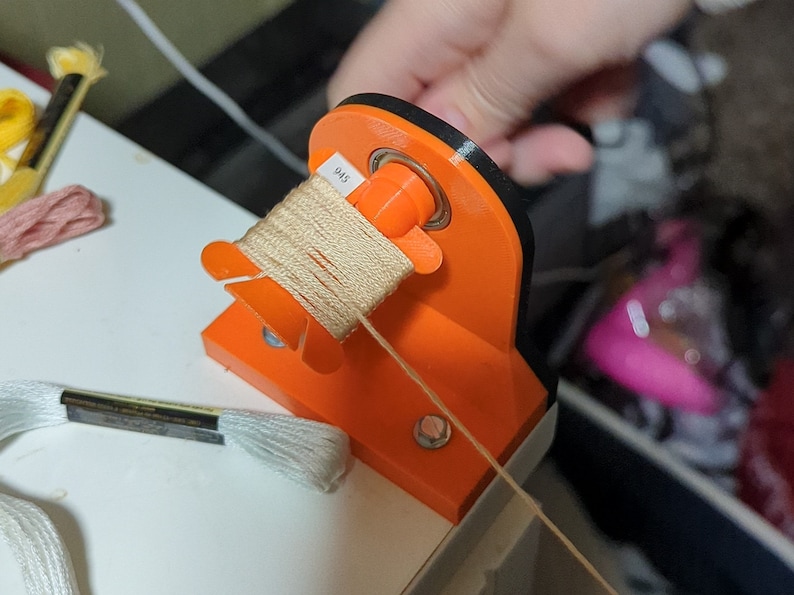 Broderigarns spolvinda: Korsstygnsorganisatör Orange