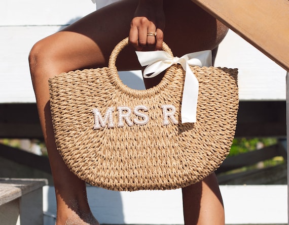 It's Mid-July and Celebs are Loving Designer Straw Totes and Mini