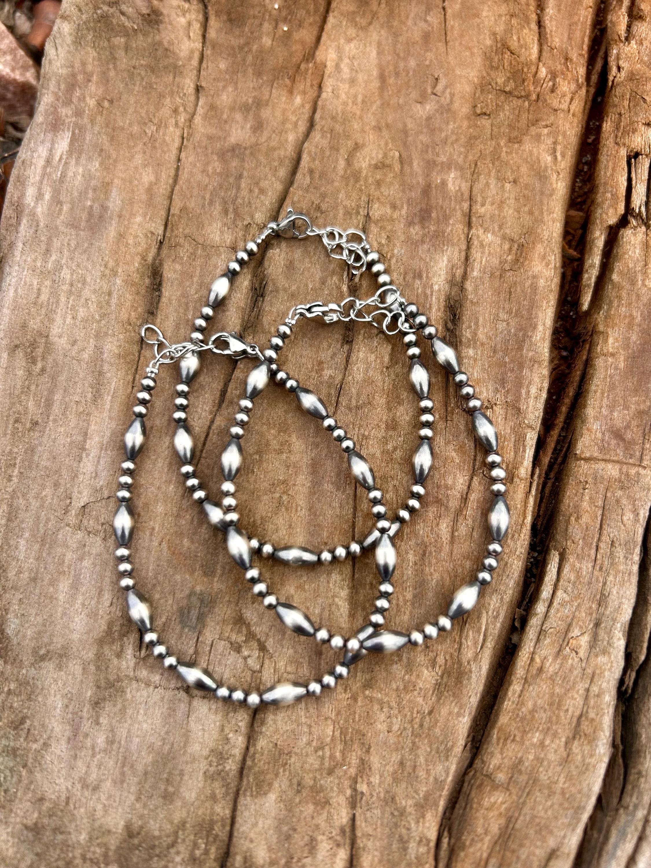 Sterling Silver Navajo Style Pearl Bracelet With Torpedo Shaped