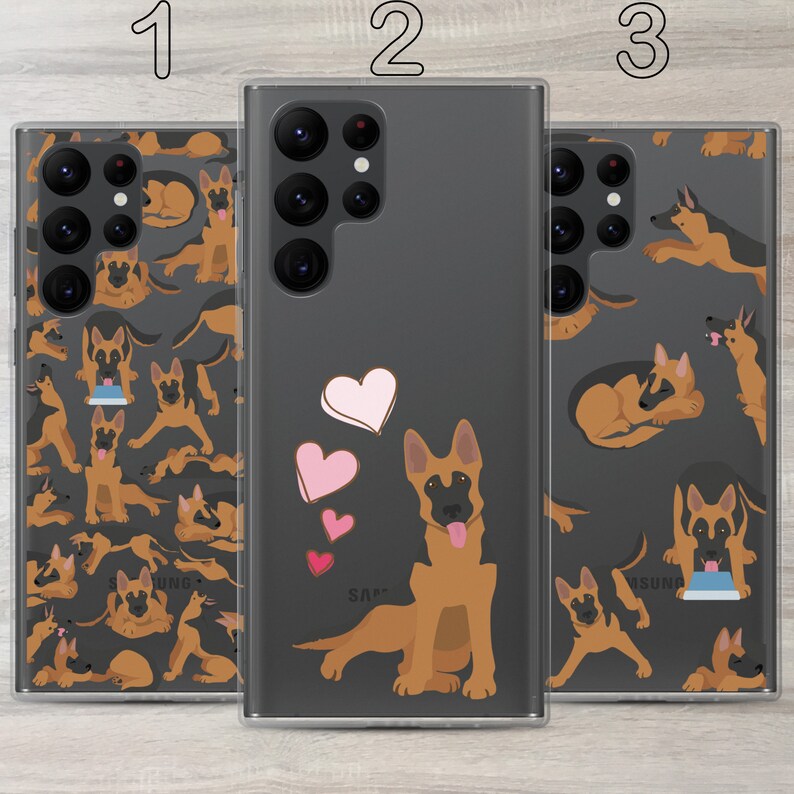 May include: Three clear phone cases with a black background and a pattern of German Shepherd dogs. The middle case has a design of pink hearts and a single German Shepherd dog in the center.