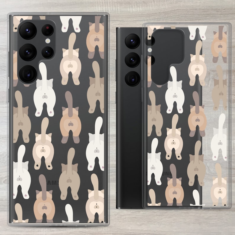 May include: A clear phone case with a black background and a pattern of brown, white and tan cats with their tails up in the air. The cats are facing away from the viewer.