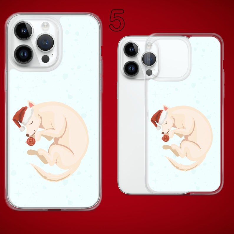 Puede incluir: Dos fundas transparentes para tel&eacute;fono con fondo blanco y una imagen de dibujos animados de un perro blanco con un gorro de Pap&aacute; Noel y sosteniendo una bola roja. El texto "5" est&aacute; impreso en la parte superior de la imagen.