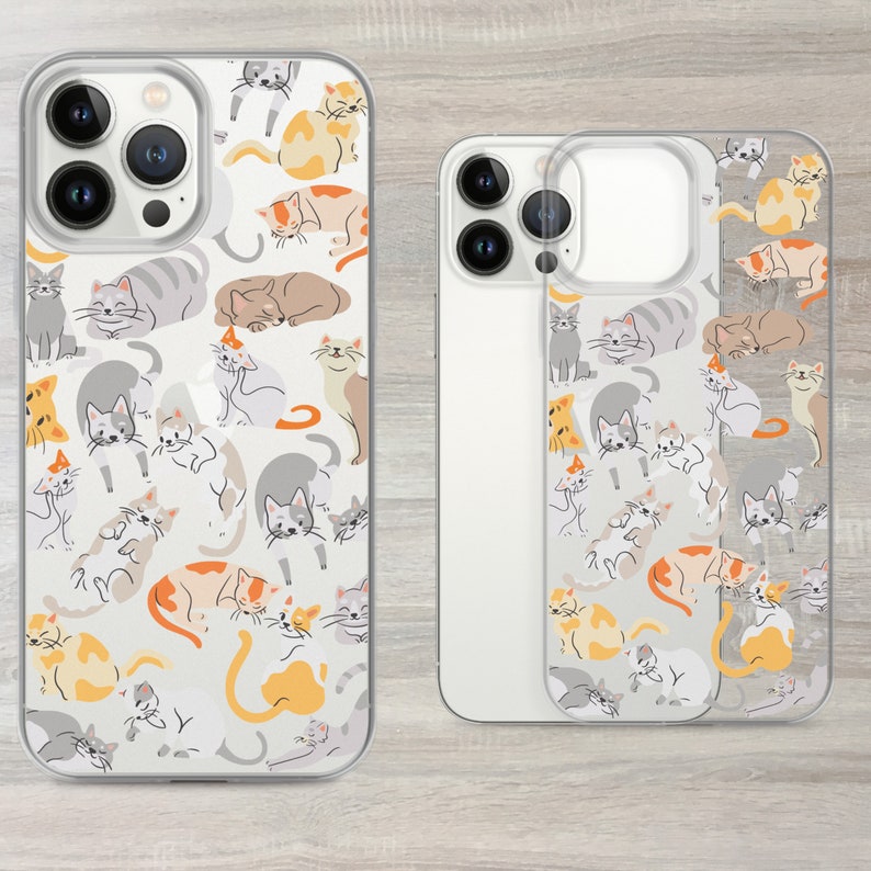 May include: Two clear phone cases featuring a pattern of colourful cats. The cases are designed for an iPhone with a camera bump.