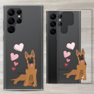 May include: A clear phone case with a black Samsung Galaxy phone inside. The case has a design of a German Shepherd dog with pink hearts.
