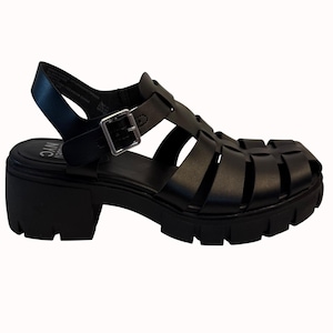 May include: Black sandal with a chunky sole and a woven cage design. The sandal features a buckle closure and a thick heel. The sole has a treaded pattern. The sandal is a size 8.