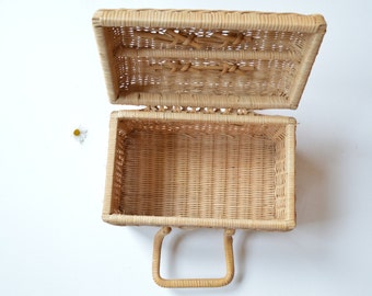 Wonderful woven wicker picnic basket with handles on top