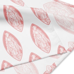 May include: White fabric with a repeating pattern of a pink outline of the Virgin Mary in a diamond shape.