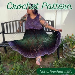 May include: A woman sits on a black bench, wearing a purple top and a crochet skirt. The skirt transitions from green to purple. The image includes the text "Crochet Pattern" and "Not a finished item".