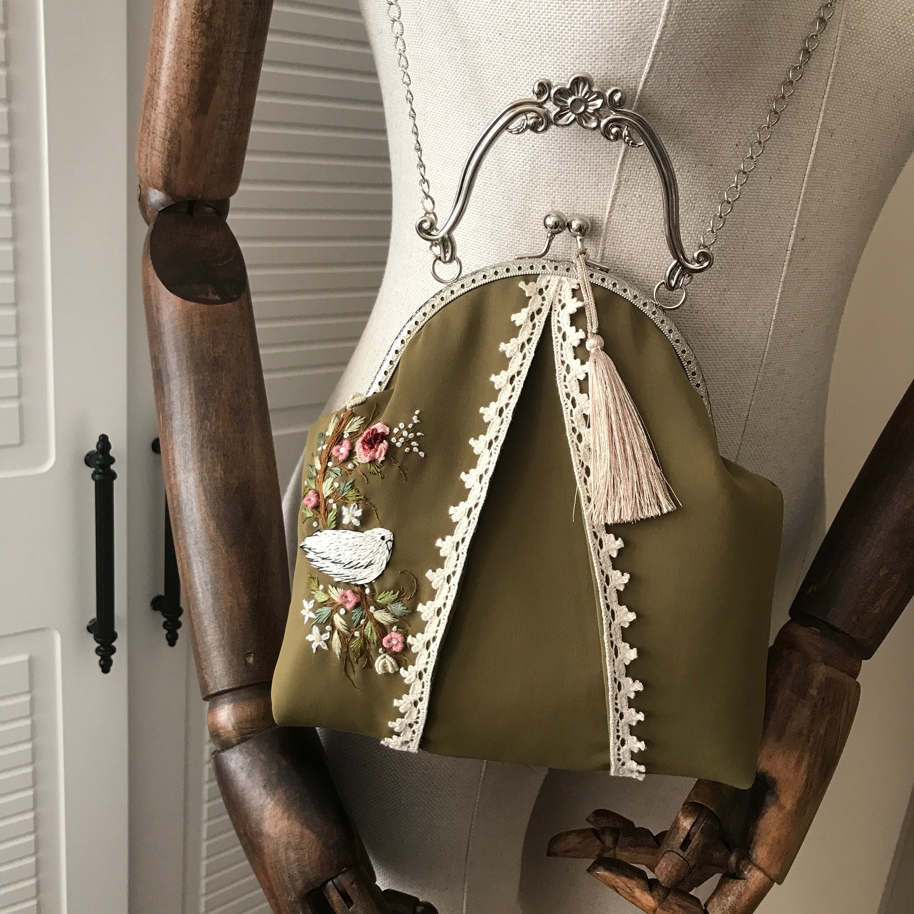 Vintage-inspired embroidered crossbody bag main image 0