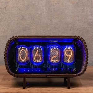 Nixie Clock IN-12 with a transparent front panel. A gift for someone who has everything