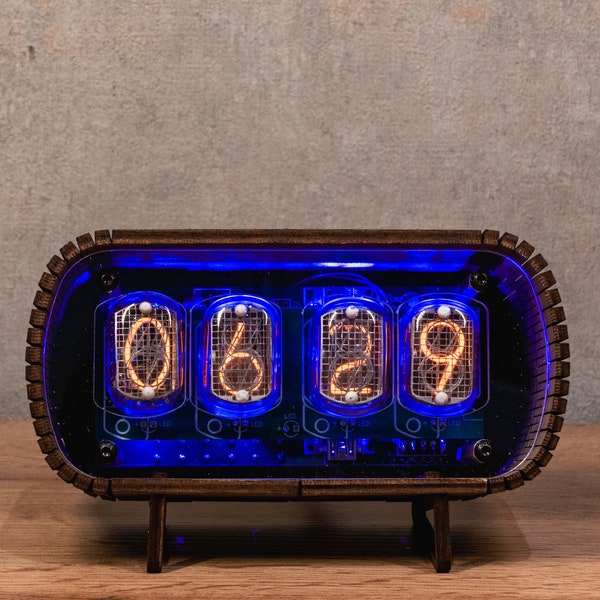 Nixie Clock IN-12 with a transparent front panel. A gift for someone who has everything