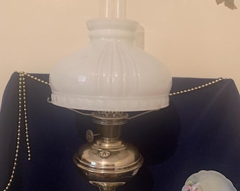 Aladdin Model No 6 Nickle Plated Oil Table Lamp with a Milk Glass Shade and Heelless Chimney 1914- 1917