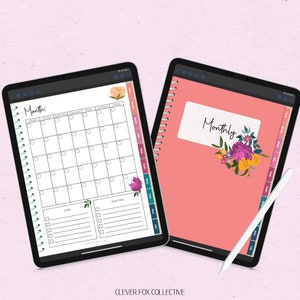 May include: Two digital planner templates on tablets. One shows a monthly calendar layout with a floral accent, the other features a cover with the word "Monthly" and a floral design. A stylus rests on the right tablet. The text "CLEVER FOX COLLECTIVE" is at the bottom.