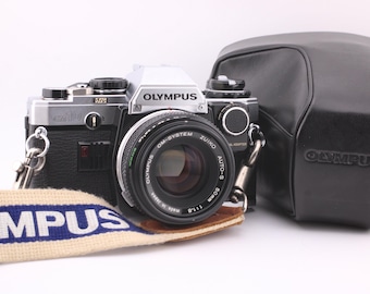 Aparat fotograficzny Olympus OM-10 SLR 35 mm z obiektywem 50 mm f1.8 w komplecie