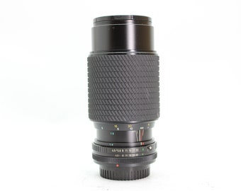 Lente Tokina 80-200 mm f4.5 para câmeras com montagem Canon FD