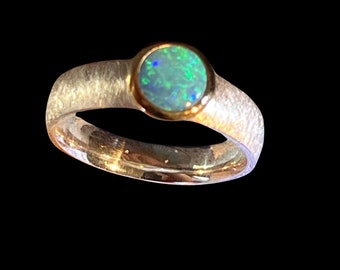 Precious opal circular flame ring with gold-plated setting