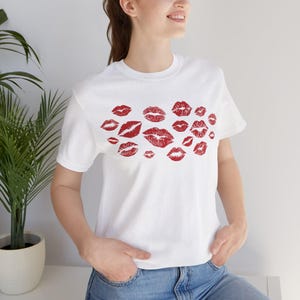 Kisses t-shirt Send someone your kisses with this T-shirt Trendy lipstick shirt kisses and Kissing vibes tee Love and kisses lips shirt