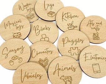 May include: Wooden toy storage labels with various categories including wooden toys, musical toys, blocks, characters, sensory, vehicles, animals, puzzles, kitchen, arts and crafts, electronics and Lego.