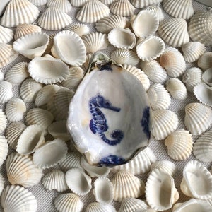 Oyster with seahorse design. Worry charm. Waterproof.