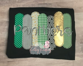May include: Black t-shirt with a green, gold, and white embroidered design that says "Panthers".