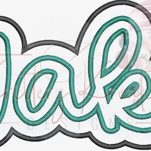 May include: A teal blue cursive word "Wake" with a black outline. The word is stylized with a rounded, bubbly font.