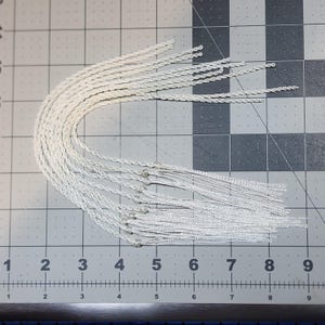 12” Nylon Replacement Popper/Crackers for whips. Bundle of 10 white nylon popper/crackers. Fits whips 6-ft+ with replaceable popper/cracker.