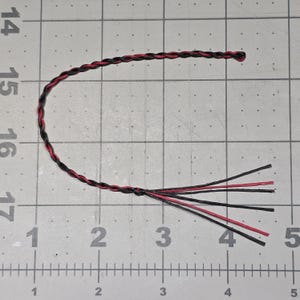 8&quot; long Black and Red B55 waxed bowstring Replacement Poppers/Crackers for most 6-ft+ whips. Bundle of 5 -- 8&quot; long (6&quot; twist / 2&quot; tassel)