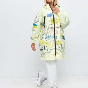 Unisex waterproof raincoat for travelling, fashionable rain jacket, Raincoat with Ukrainian pattern, raincoat with pockets