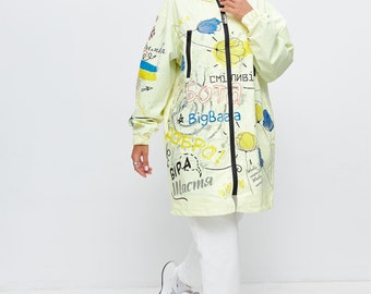 Unisex waterproof raincoat for travelling, fashionable rain jacket, Raincoat with Ukrainian pattern, raincoat with pockets