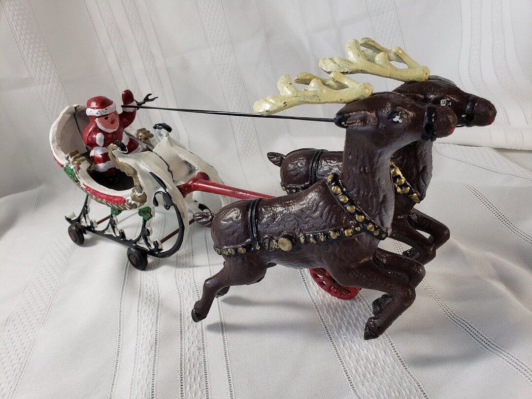 Vintage Christmas Toy in a Hubley Style Cast Iron Santa on Sleigh With